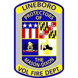 Lineboro Volunteer Fire Department patch featuring "Protectors of the Mason-Dixon" with American flag, Maryland flag, and fire department emblems in a blue and yellow shield design.