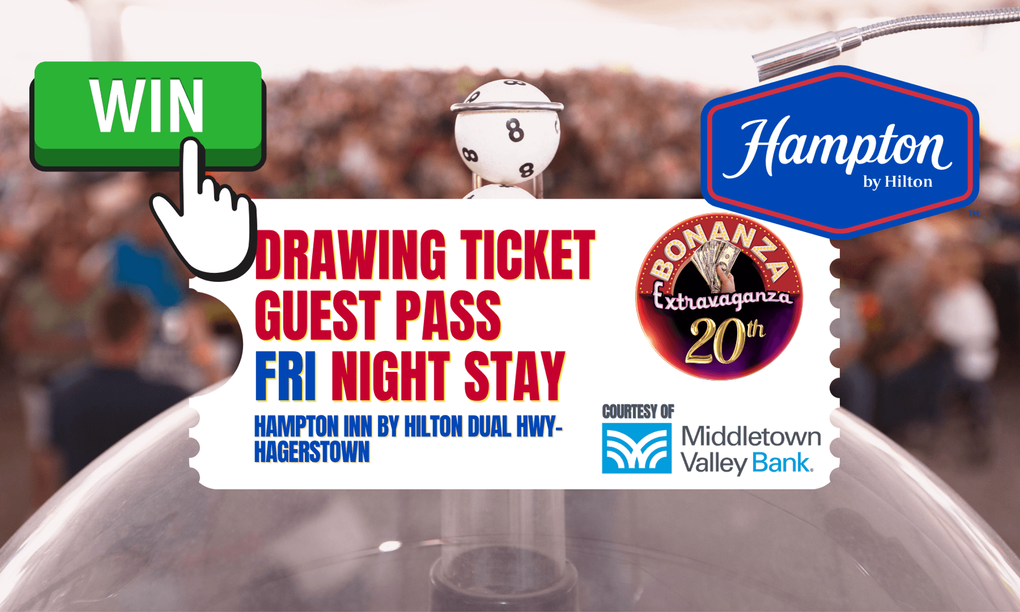 A promotional graphic featuring a bingo ball cage advertising a giveaway for a drawing ticket, guest pass, and Friday night stay at Hampton by Hilton, sponsored by Middletown Valley Bank.