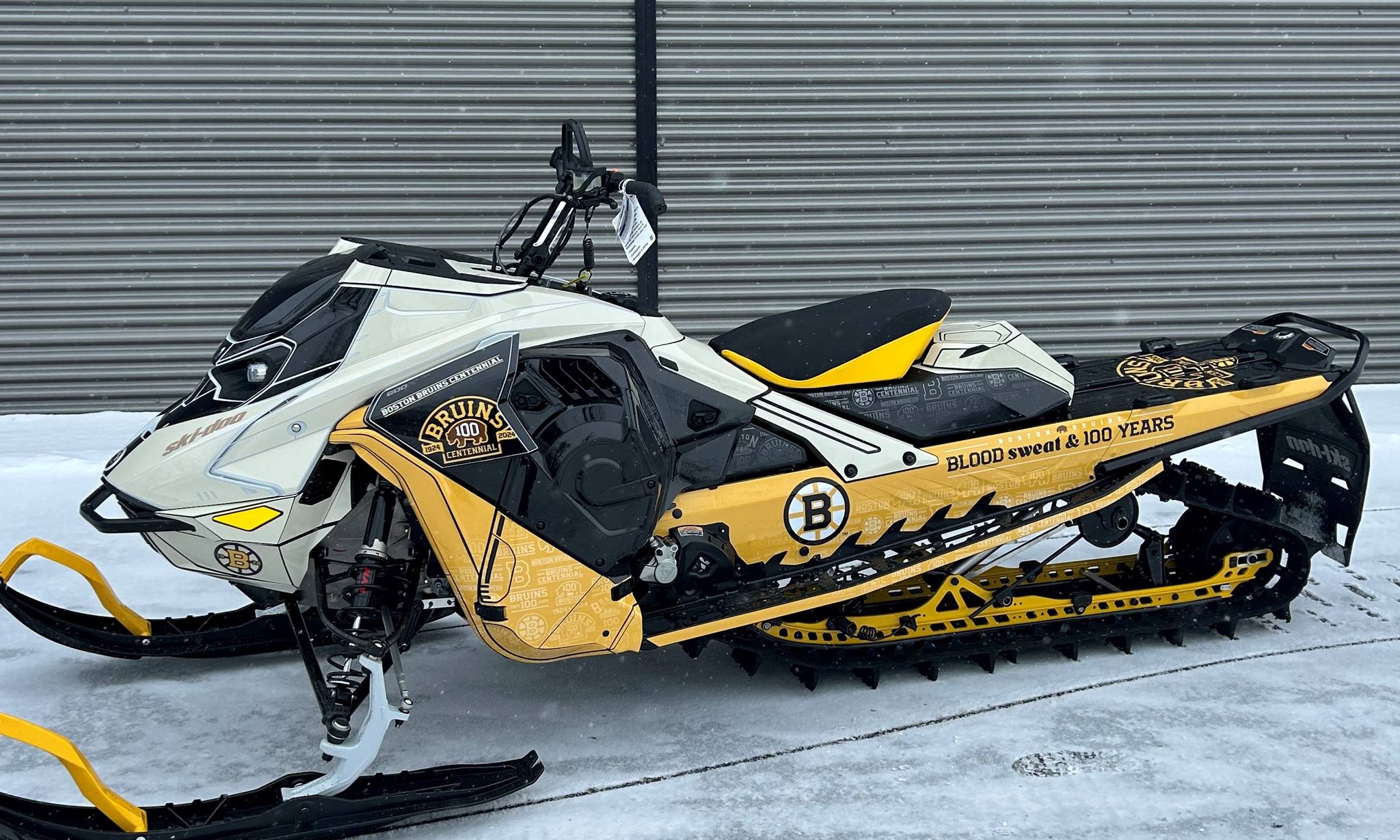 Bruins Centennial Package- Bruins Custom Snowmobile & 2 Bruins Centennial Game Tickets  event banner