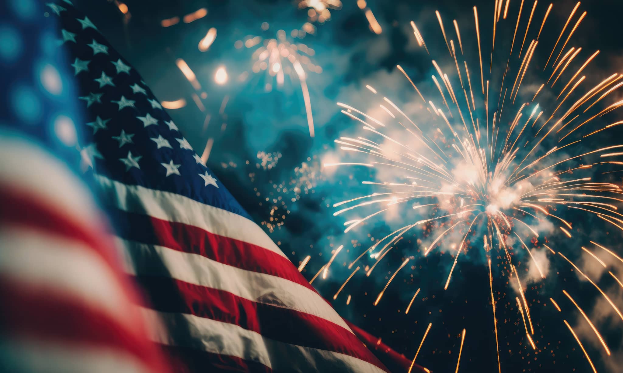 American flag with gold and white fireworks bursting against a dark teal night sky, celebrating Independence Day with patriotic imagery.