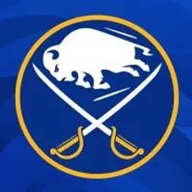 Buffalo Sabres hockey team logo featuring a white buffalo head inside a blue circle with gold crossed swords and circular border.