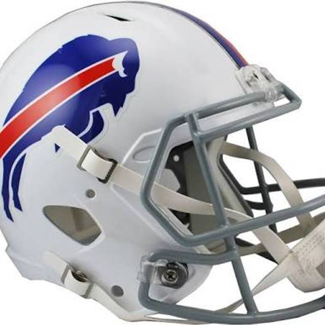 White football helmet with blue buffalo head logo and red diagonal stripe, featuring a gray face mask and gray chin strap.