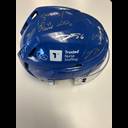 Blue hockey helmet with Trusted Nurse Staffing logo, covered in multiple silver autograph signatures