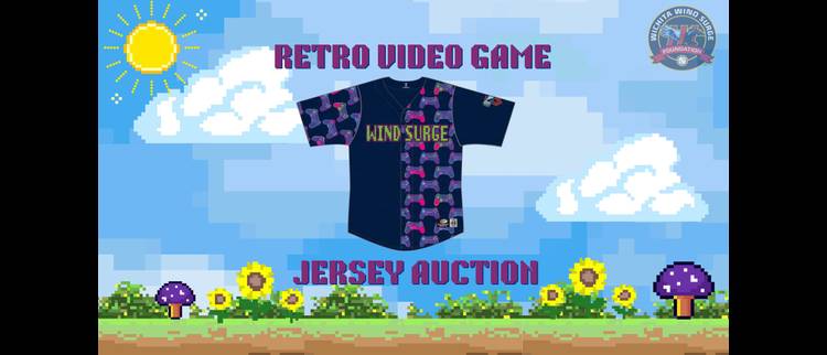 Retro 8-bit video game style poster featuring a black "Wind Surge" baseball jersey with purple gamepad pattern displayed against a pixelated sky with sun, clouds, and mushrooms, advertising a jersey auction for the Wichita Wind Surge Foundation.